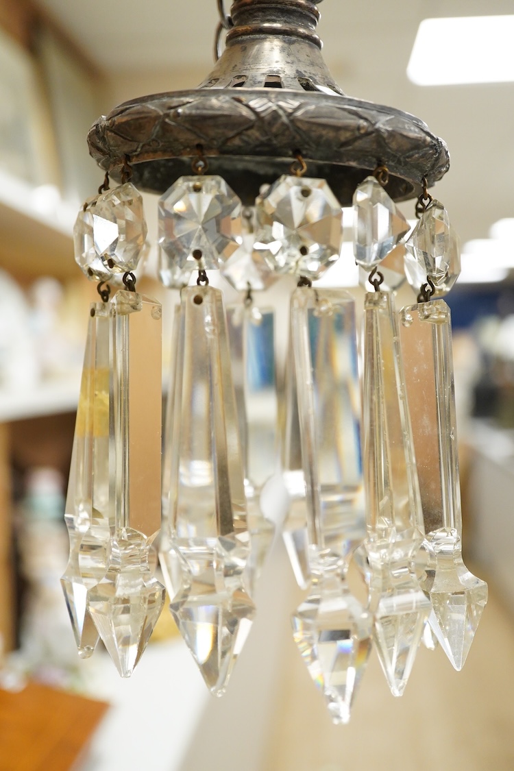 Sundry items to include a plated lustre drop hanging light, decanter labels and a small pot, mounted with a putti
